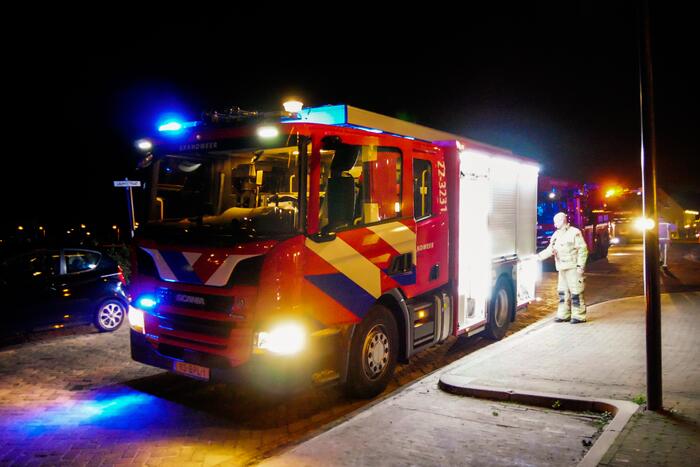 Deur opgebroken vanwege vlam in de pan