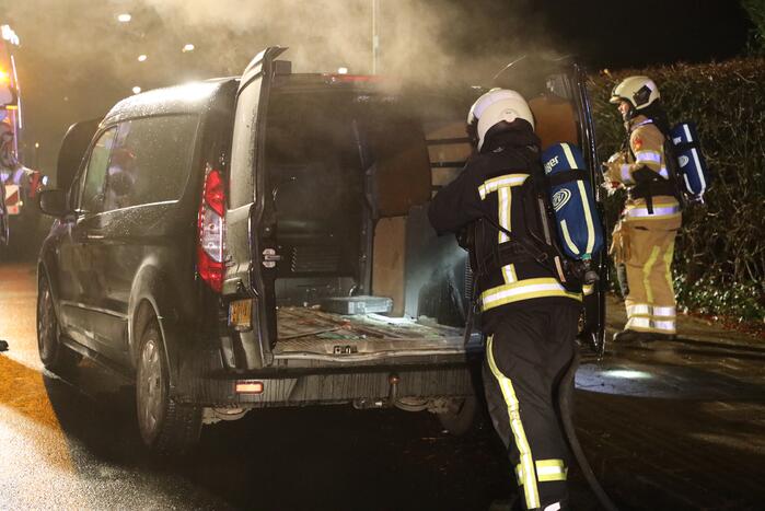 Forse schade na brand in bestelbus