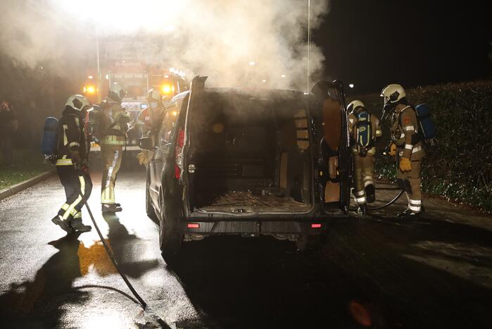 Forse schade na brand in bestelbus