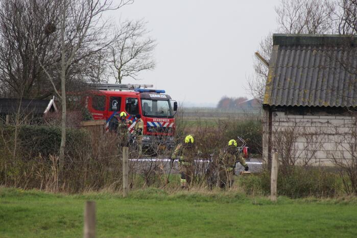 Brandweer blust brandende elektrische fiets