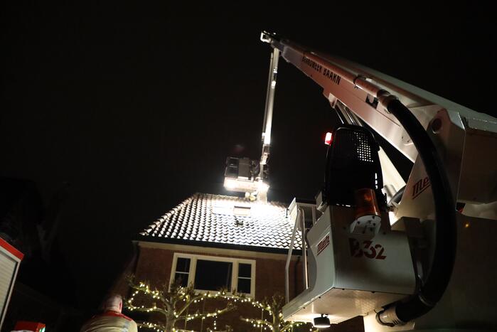 Brand in schoorsteen van woning