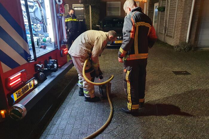 Brand in schoorsteen van woning