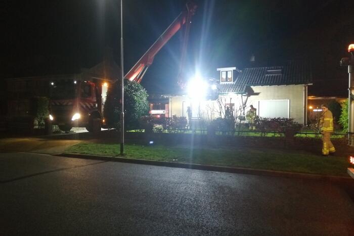 Brand in schoorsteen van woning
