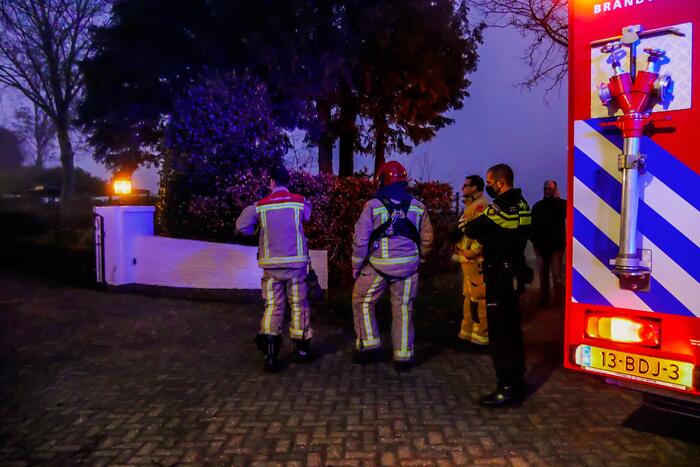 Brandweer blust schoorsteenbrand