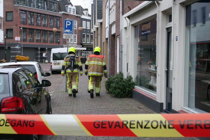 Gaslekkage in winkelstraat