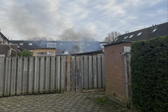 Schutting flink beschadigd door brand