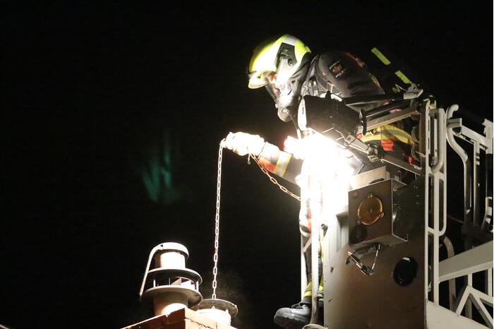 Brand in schoorsteen van woning
