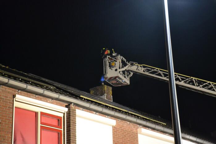 Schoorsteen geveegd na brand