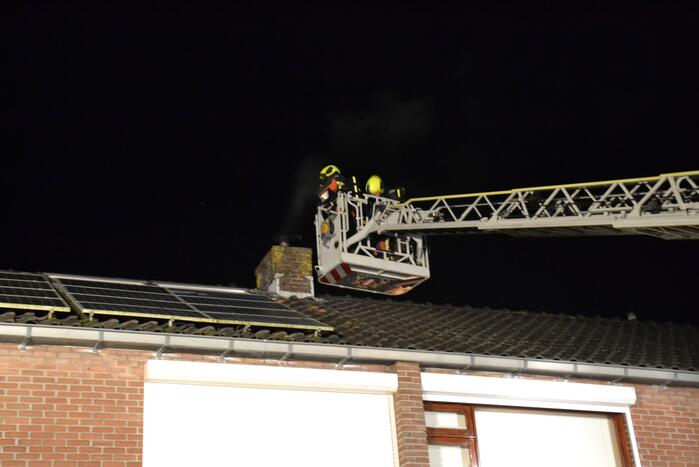 Schoorsteen geveegd na brand