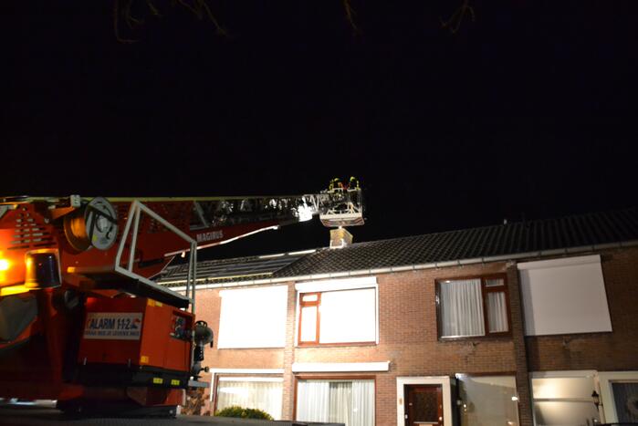 Schoorsteen geveegd na brand