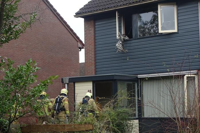 Witgoed-apparaat vat vlam