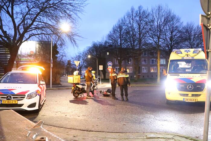 Ongeval tussen bezorgscooter en fietster