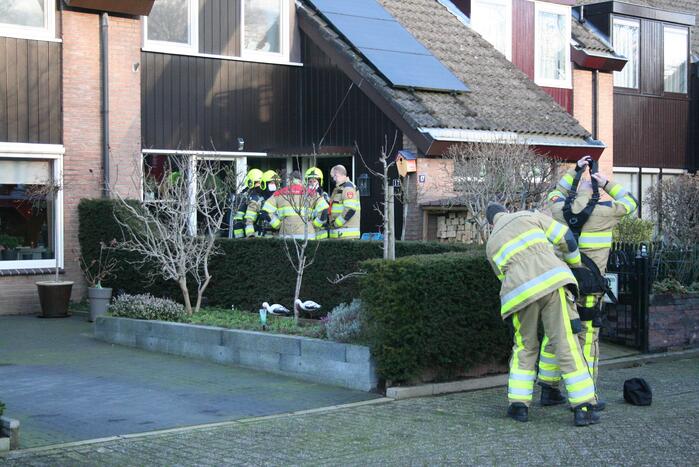 Brandweer blust schoorsteenbrand