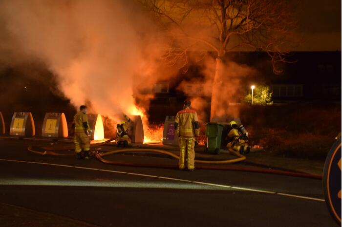 Brand in meerdere papiercontainers