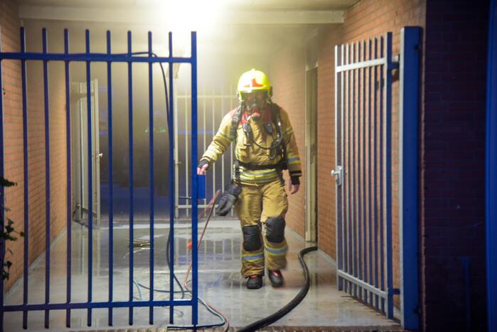 Woningen ontruimd door brand in kelderbox
