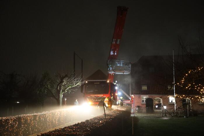 Veel rook door schoorsteenbrand