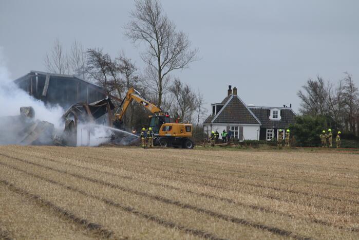 Brand in schuur met gestalde caravans