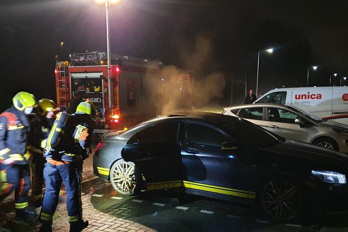 Binnenkant van auto in brand