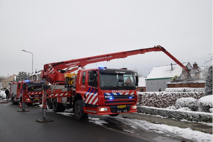 Brand in garage door houtkachel