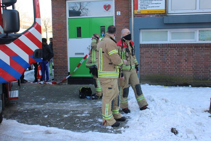 Brandweer blust uitslaande woningbrand