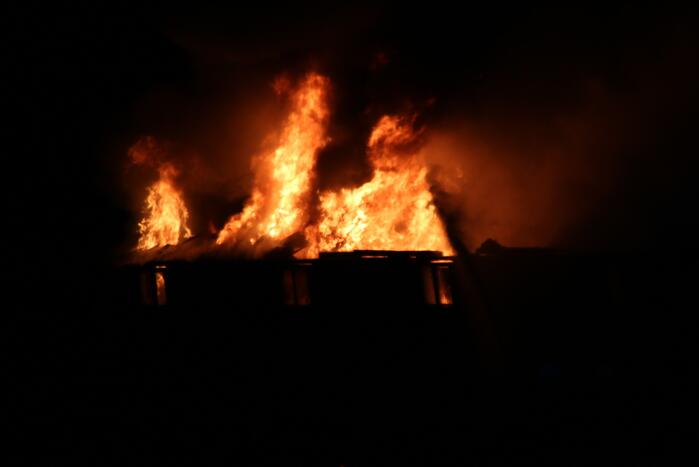 Uitslaande brand in schuur