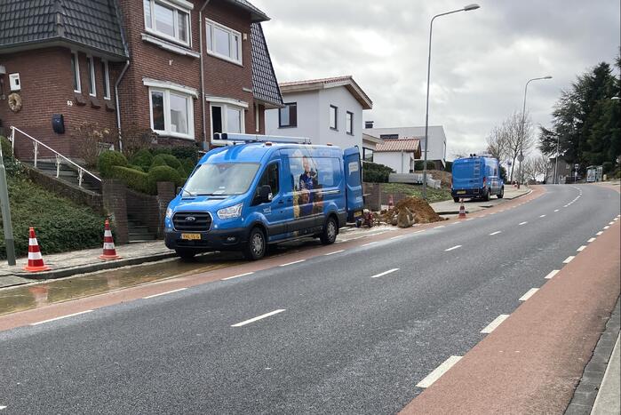 Straat onder water na leidingbreuk