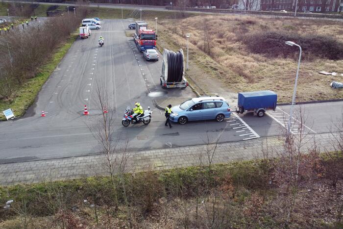 Grote politiecontrole parkeerterrein Superfun
