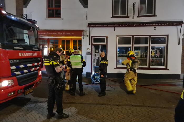 Veel rookontwikkeling bij brand in winkelpand