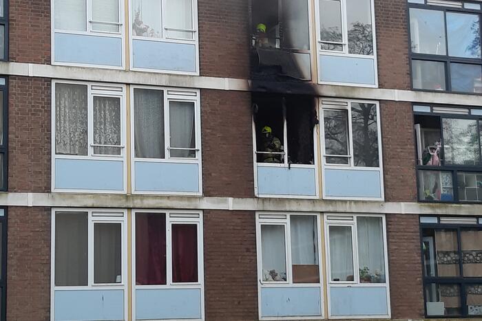 Veel schade bij brand in portiekwoning