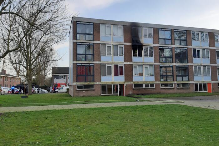 Veel schade bij brand in portiekwoning