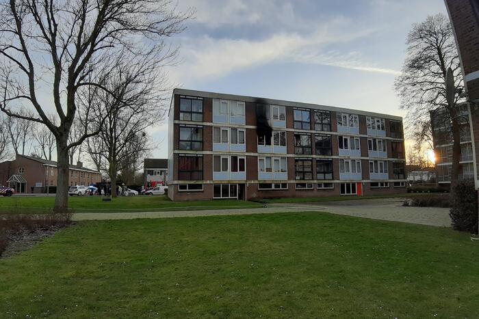 Veel schade bij brand in portiekwoning