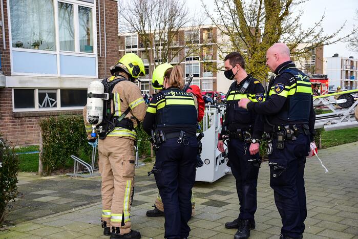 Veel schade bij brand in portiekwoning