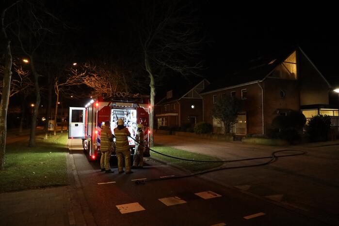Meerdere papiercontainers in vlammen op