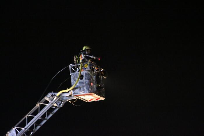 Grote uitslaande brand in fietsenzaak
