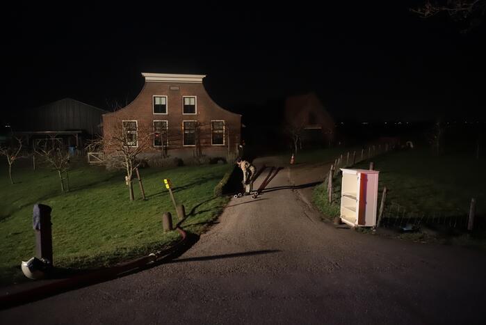 Grote hoop afval in brand