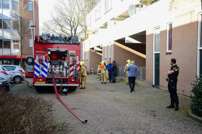 Flatwoningen ontruimd door brand