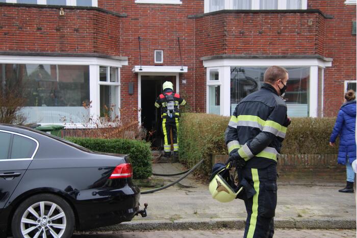 Brand achter woning