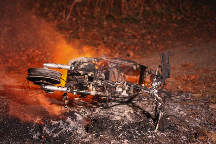 Scooter in brand gestoken