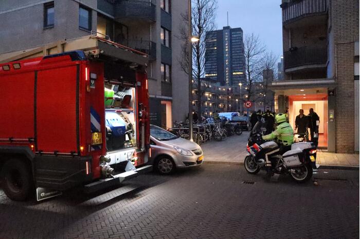 Brand in flatwoning boven winkels