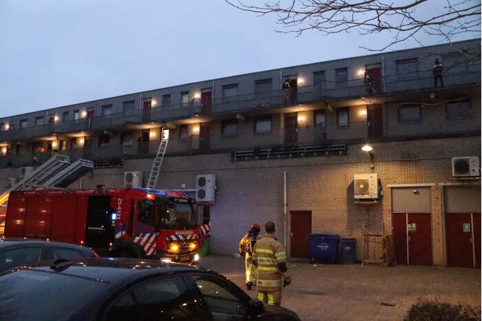 Brand in flatwoning boven winkels