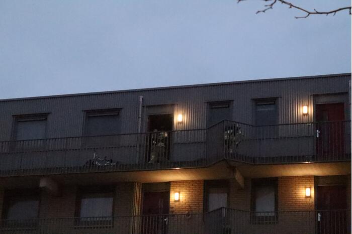 Brand in flatwoning boven winkels