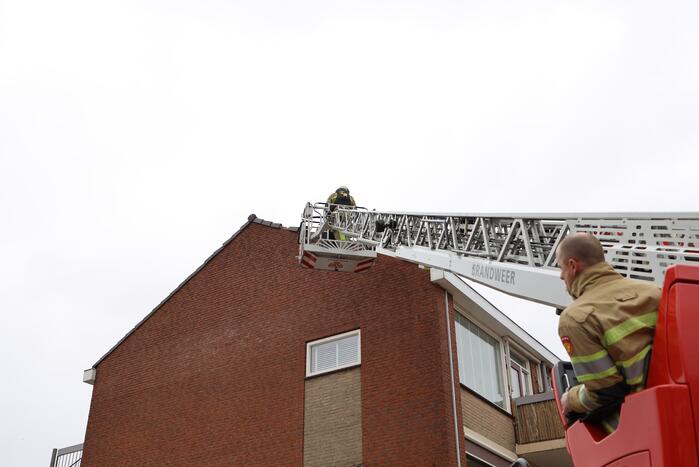 Dakpannen woning losgewaaid