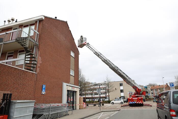 Dakpannen woning losgewaaid