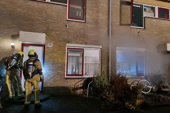 Forse rookontwikkeling bij woningbrand