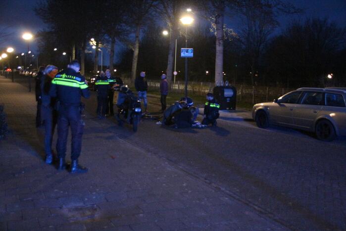 Maaltijdbezorger en fietser in botsing