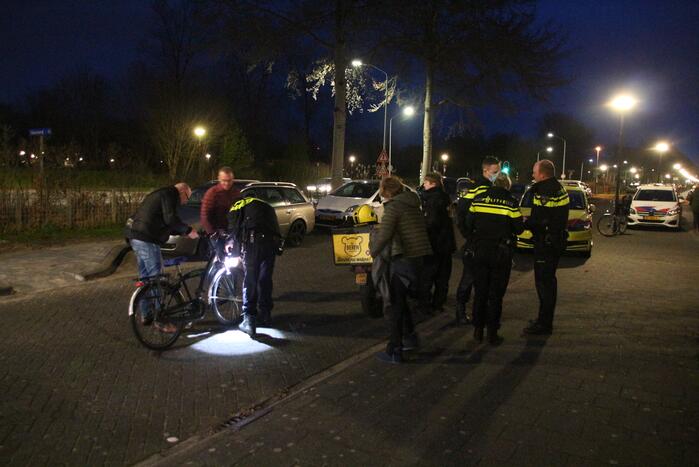Maaltijdbezorger en fietser in botsing
