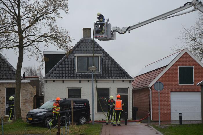 Woning vol rook bij brand