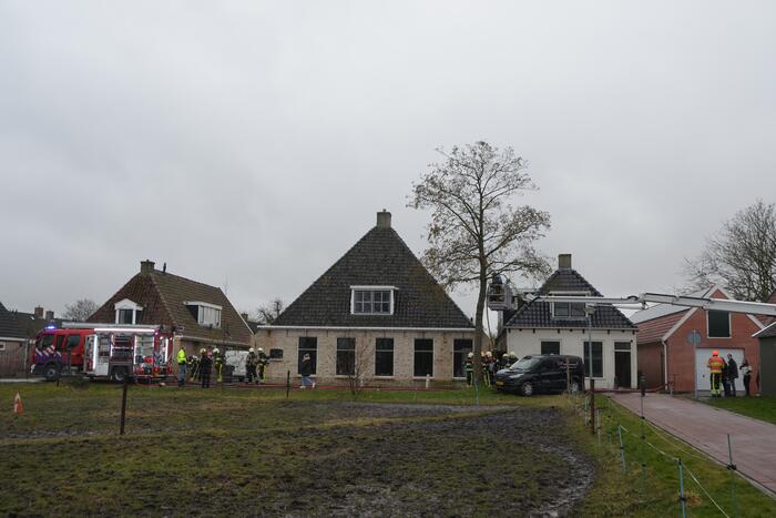 Woning vol rook bij brand