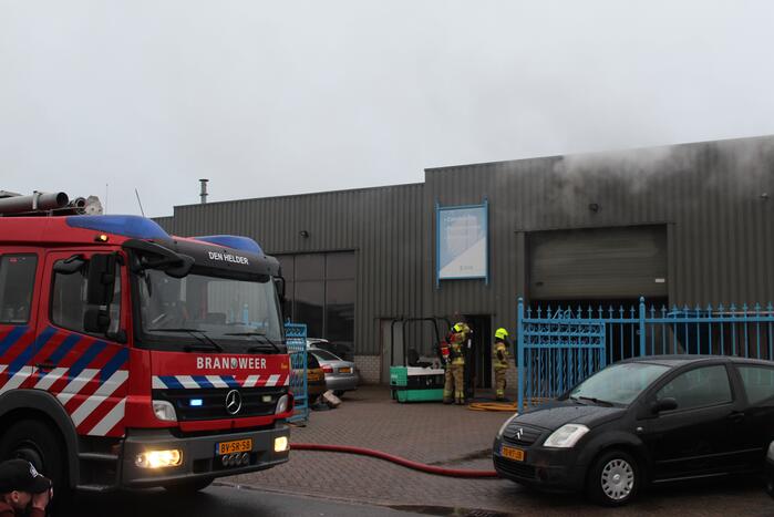Veel rookontwikkeling na brand in machine