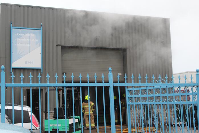 Veel rookontwikkeling na brand in machine